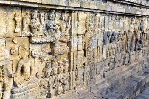 Wallpaper Mural Beautiful bas-relief wall decor carved in stone at Borobudur Temple, Yogyakarta, Indonesia Torontodigital.ca