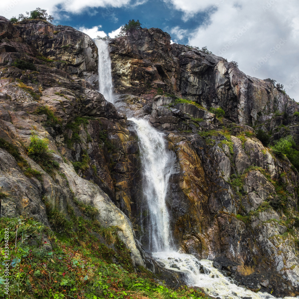 mountain waterfall from Ushba glasier river Georgia Svaneti