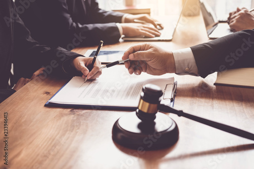 Lawyer give his customers signed a contract in the document. Consulting in regard to the various contracts
