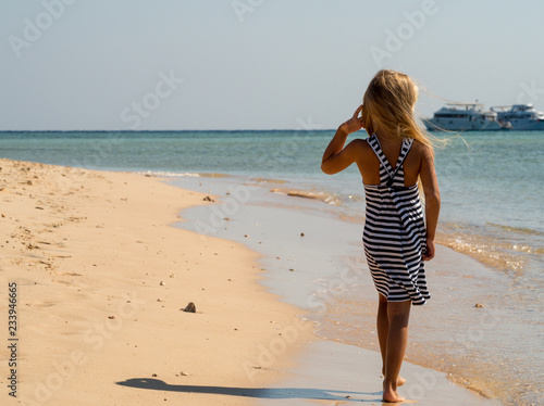 Wallpaper Mural young woman on the beach Torontodigital.ca