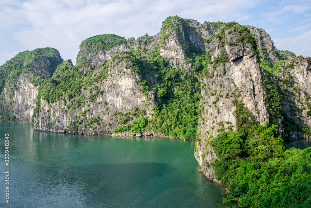Panoramic view of Ha Long Bay. Located in the north of Vietnam, Ha Long Bay is one of the world's most famous nature heritages Panoramic view of Ha Long Bay. Located in the north of Vietnam, Ha Long Bay is one of the world's most famous nature heritages
