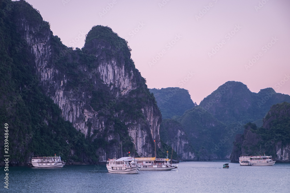 Panoramic view of Ha Long Bay in the sunset. Located in the north of Vietnam, Ha Long Bay is one of the world's most famous nature heritages