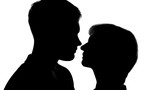 Male and female silhouettes preparing to kiss on romantic date, tender feelings