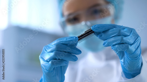 Фотография Computer engineer studying microchip, information technology industry, espionage