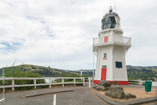 Lighthouse over seacoast New Zealand natural landscape background photo