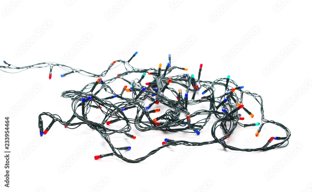 Festive colorful Christmas lights isolated on white background and texture, with clipping path Festive colorful Christmas lights isolated on white background and texture, with clipping path