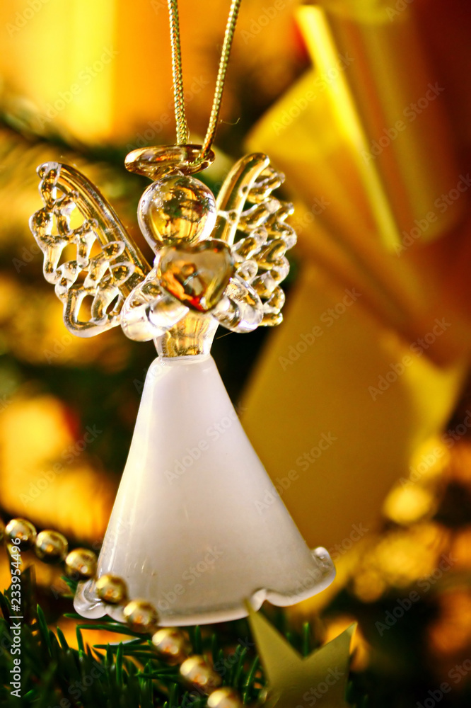 Toy glass angel decoration on the xmas tree