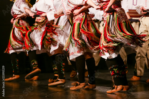 Young Serbian dancers in traditional costume. Folklore of Serbia photo
