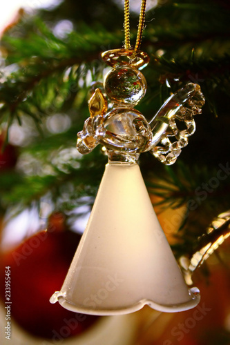 Toy glass angel decoration on the xmas tree