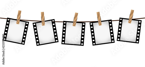 Five photo film slides on a rope with clothepins