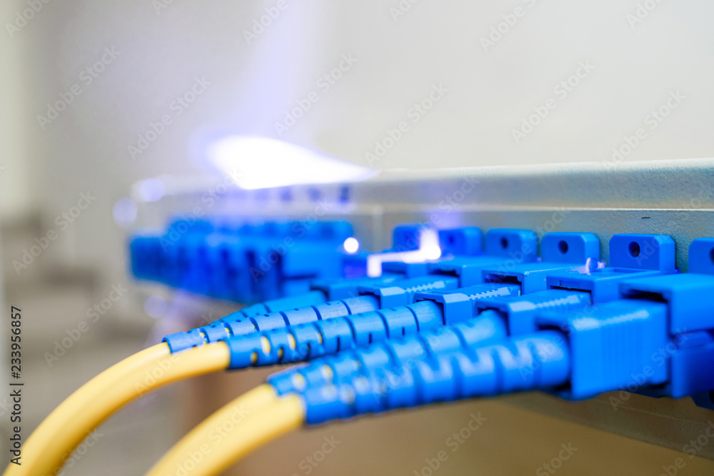 Batch wires are connected in the Optical Fiber Distribution Frame. The concept of high-speed Internet connection. Selective focus Batch wires are connected in the Optical Fiber Distribution Frame. The concept of high-speed Internet connection. Selective focus