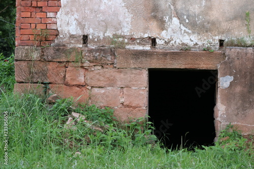 old brick wall with window