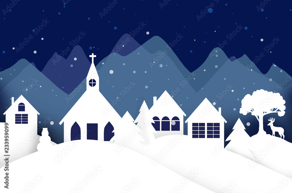 Christmas village scene with Church steeple and mountains in the background, beautiful holiday landscape with snow falling on white cut-out houses with deer, trees and snowman