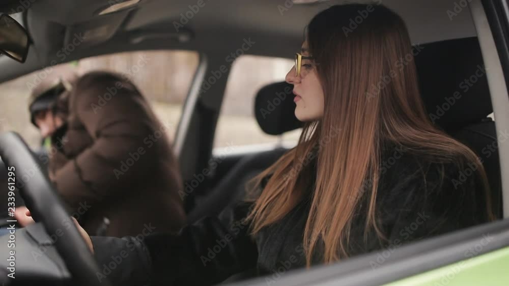 Woman sitting in car meets with an arms dealer and becomes a gun for cash. Woman for revenge buys an illegal gun. Woman sitting in car meets with an arms dealer and becomes a gun for cash. Woman for revenge buys an illegal gun.