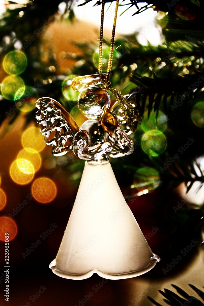 Toy glass angel decoration on the xmas tree