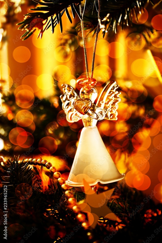 Toy glass angel decoration on the xmas tree
