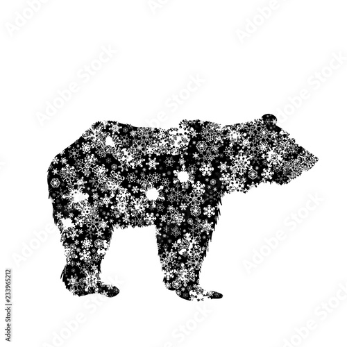 Vector silhouette of bear with snowflakes.