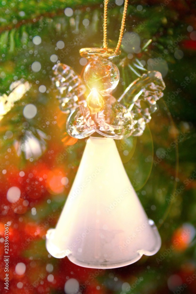 Toy glass angel decoration on the Christmas tree