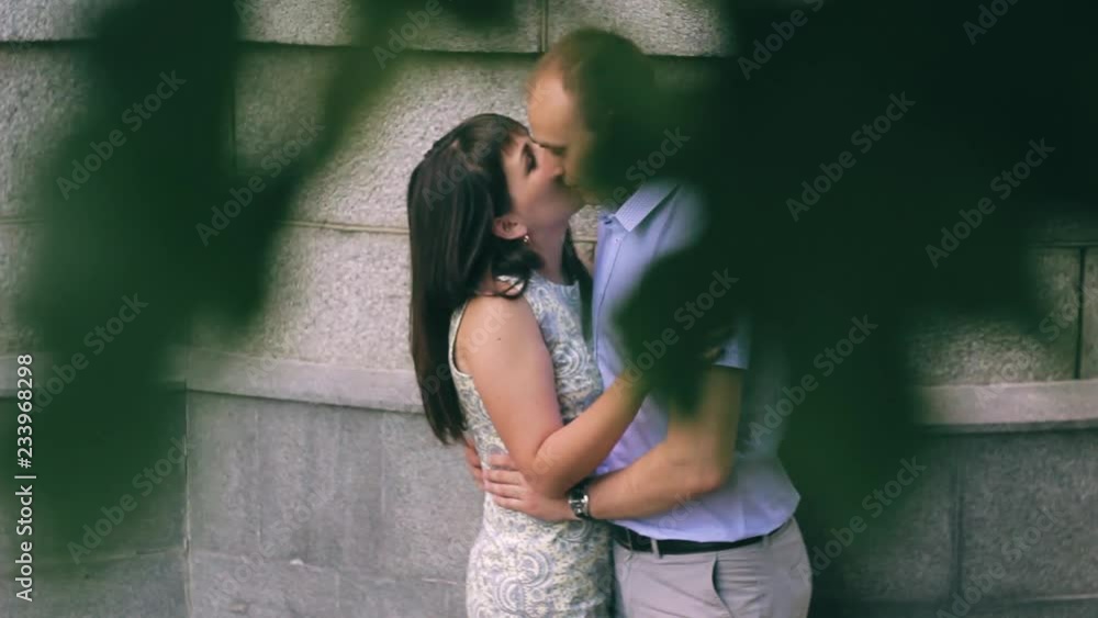 young loving couple walking in the park outdoors young loving couple walking in the park outdoors