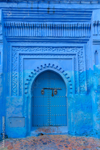 Typical door in blue city of Chefchaouen Morocco © vladislavmavrin
