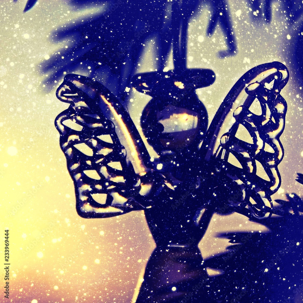 Toy glass angel decoration on the xmas tree