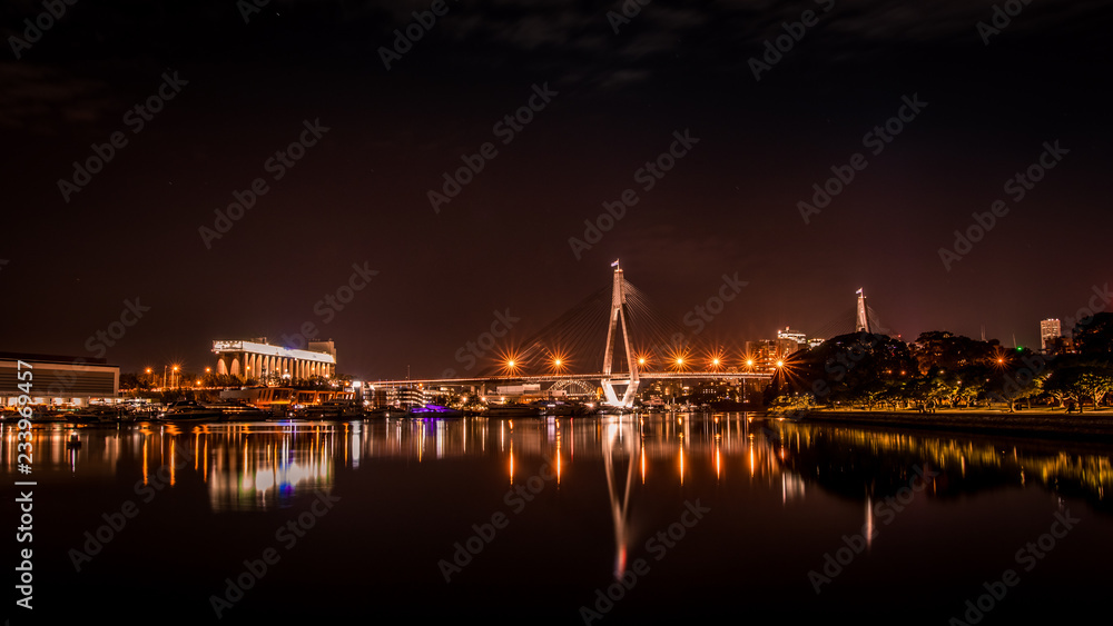 ANZAC Bridge night time long exposure. Relfection of city lights. ANZAC Bridge night time long exposure. Relfection of city lights.