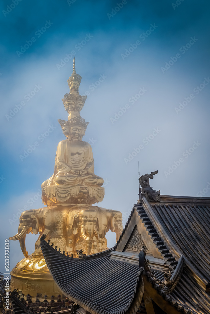 Giant golden Buddha statue on top of Emei Mountain in China