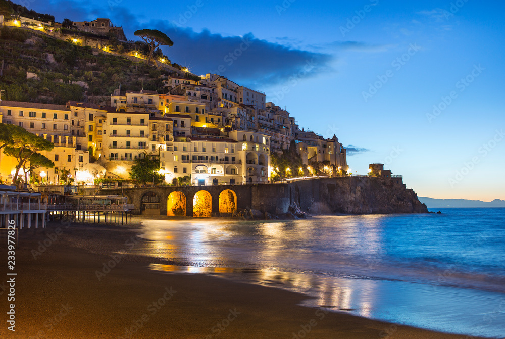 golden lights in morning twilight on Amalfi coast in Italy