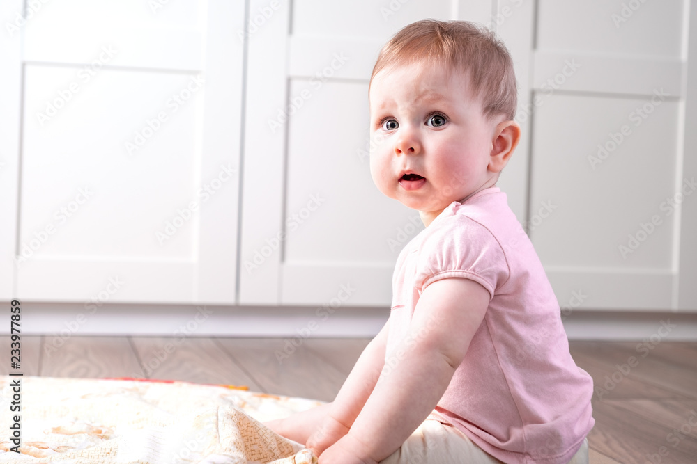 baby playing on floor baby playing on floor