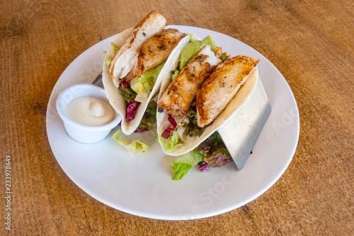 Fish Tacos Served in a Restaurant photo