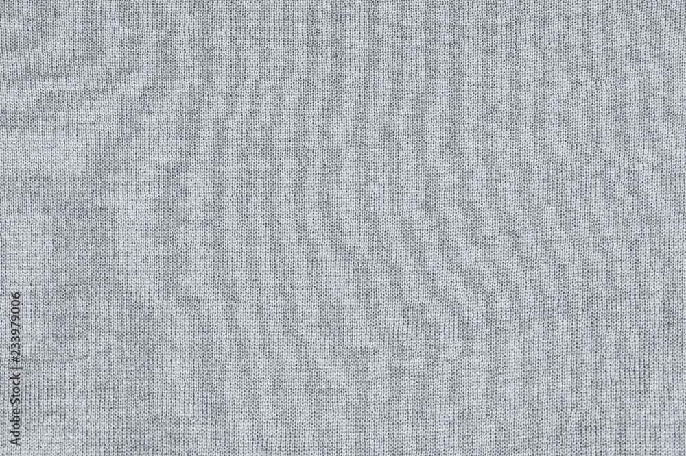 Knitted gray texture of fabric Knitted gray texture of fabric