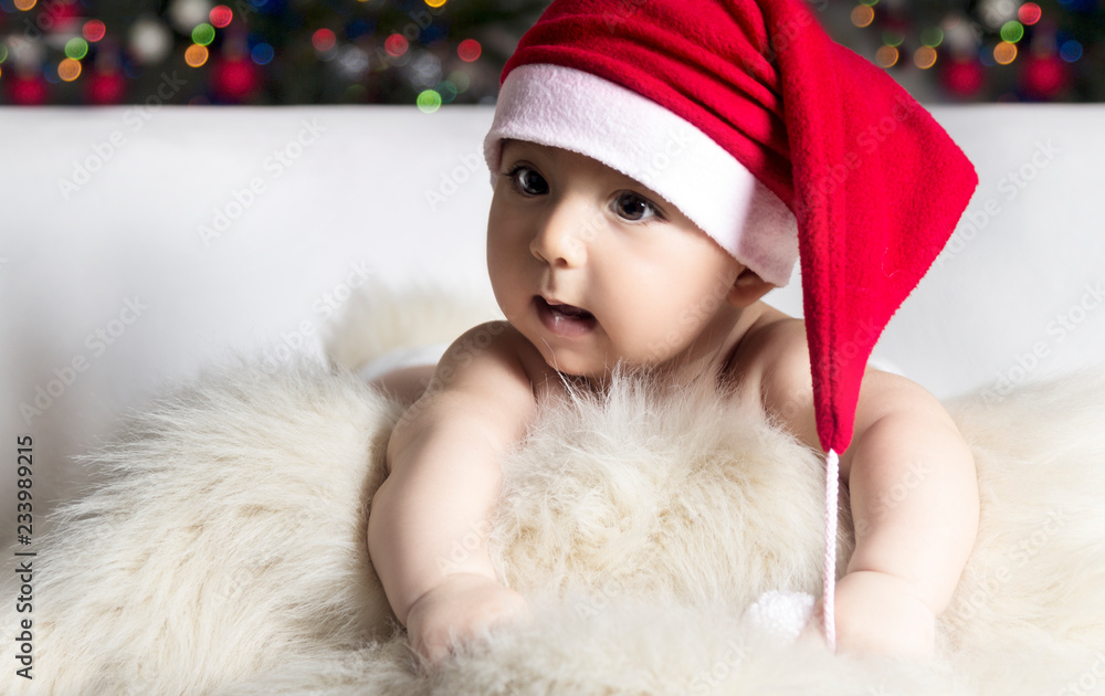 Little boy in Christmas Santa's hat - Stock image Little boy in Christmas Santa's hat - Stock image