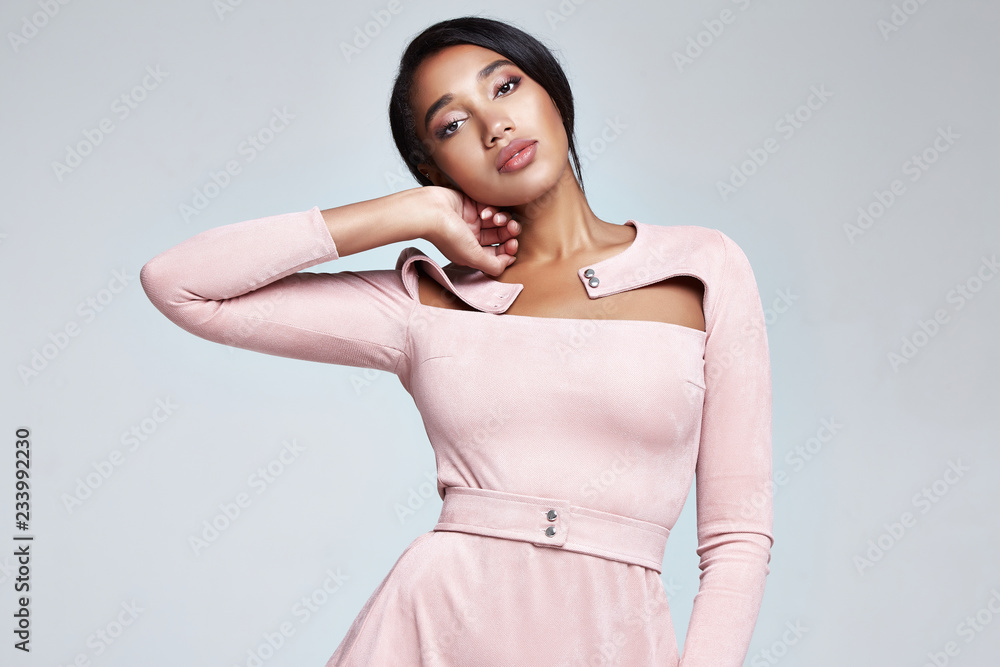 Portrait fashion sexy woman beautiful face perfect body shape mulatto skin  cosmetic makeup hair style elegant clothes casual wear dress glamour model  pose party office dress code accessory. Stock Photo | Adobe