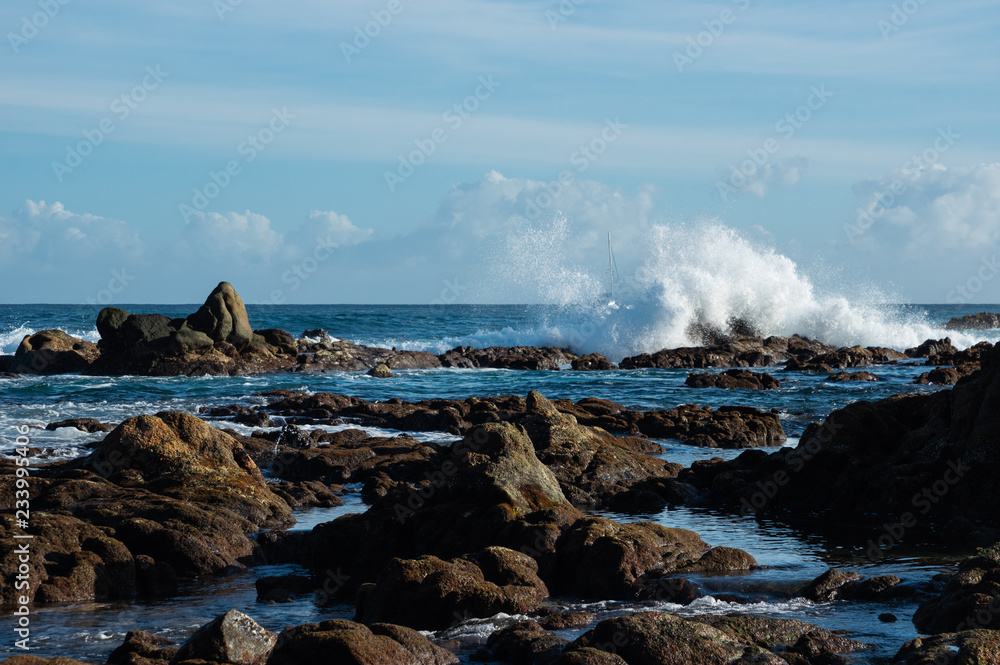 many rocks facing the ocean