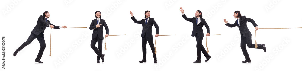 Young businessman pulling rope isolated on white Young businessman pulling rope isolated on white
