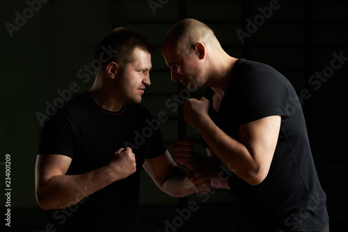 Two man with fist up