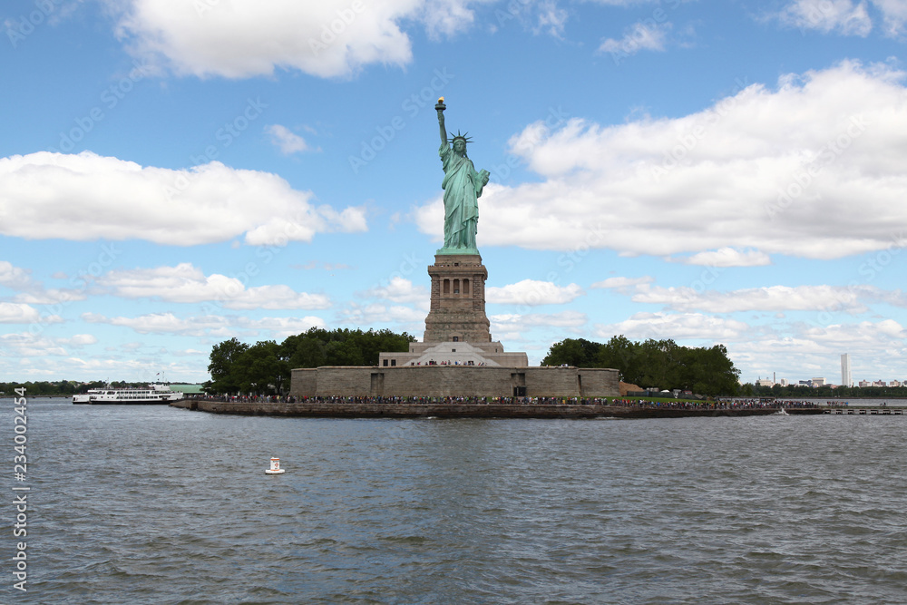 Fototapeta premium New york ,USA-June 15 ,2018:People visit the Statue of liberty is famous in New York ,USA