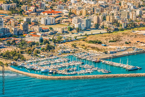 Obraz na płótnie Sea port city of Larnaca, Cyprus. View from the aircraft to the coastline, beaches, seaport and the architecture of the city of Larnaca. w salonie