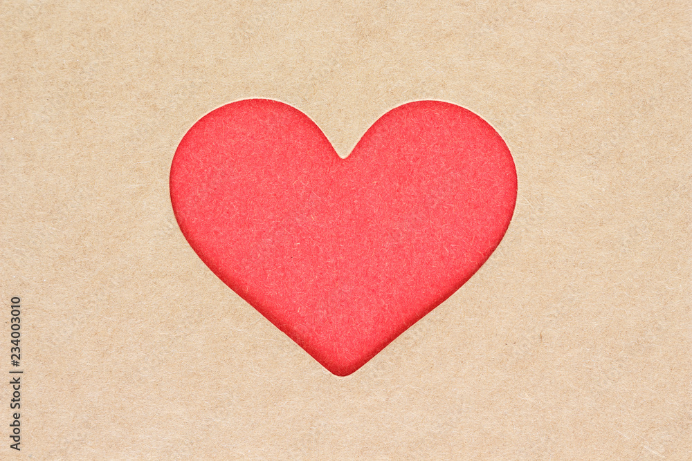 red heart space on cardboard. red heart space on cardboard.