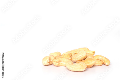 heap cashews on white background.