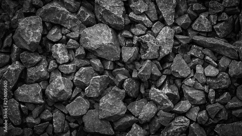rubble texture natural abstract dark black and white vignette background close-up