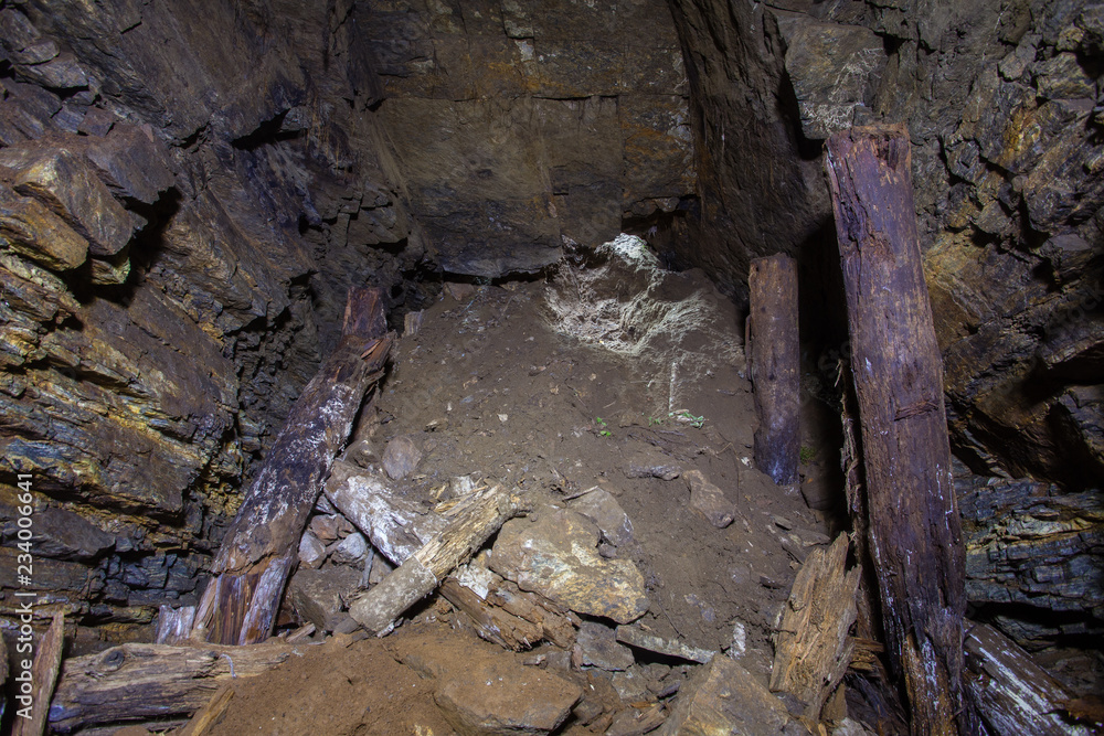 Underground abandoned gold iron ore mine shaft tunnel gallery passage collapsed
