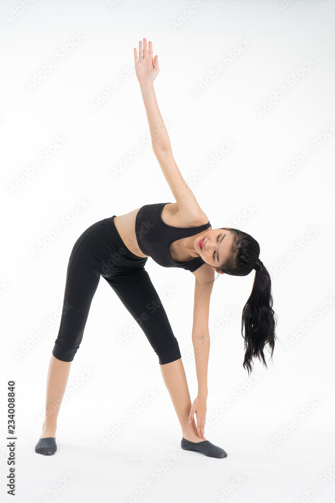 Sporty young asian woman doing yoga practice isolated on white background - concept healthy life fitness for slim. Sporty young asian woman doing yoga practice isolated on white background - concept healthy life fitness for slim.