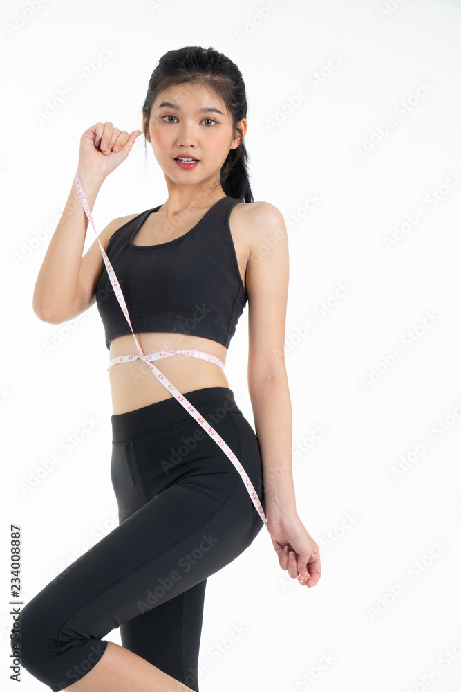 Sporty young asian woman doing yoga practice isolated on white background - concept healthy life fitness for slim. Sporty young asian woman doing yoga practice isolated on white background - concept healthy life fitness for slim.
