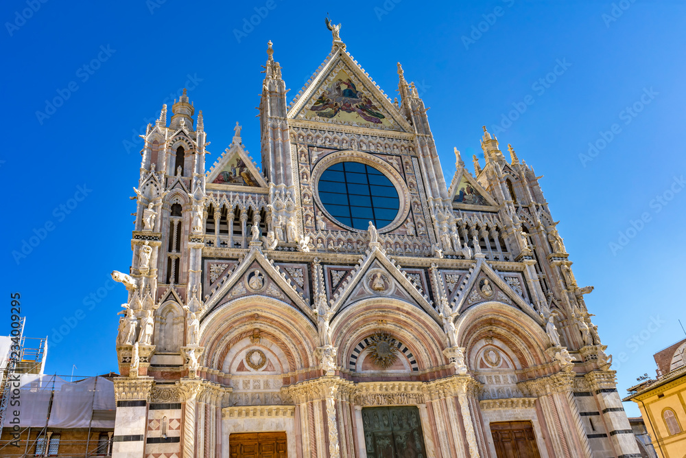 Facade Towers Mosaics Cathedral Siena Italy