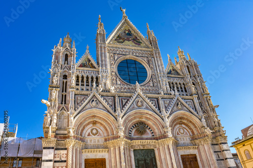 Facade Towers Mosaics Cathedral Siena Italy