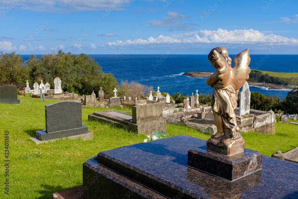 Angel looking out to sea at peaceful historic Gerringong Cemetery, with beautiful views out across the sea, Gerringong, NSW, Australia