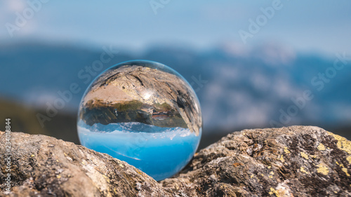 Crystal ball alpine landscape shot at Fuegen - Tyrol - Austria