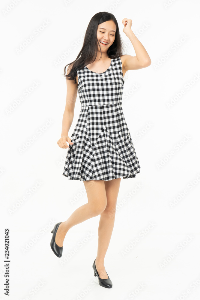 portrait of excited surprised attractive inspired girl jumping up isolated on background.Freedom legs stylish feet glamorous people teenager asian. portrait of excited surprised attractive inspired girl jumping up isolated on background.Freedom legs stylish feet glamorous people teenager asian.