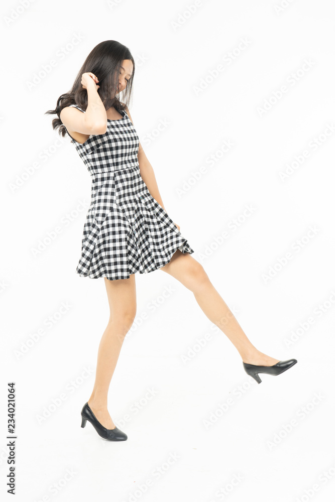 portrait of excited surprised attractive inspired girl jumping up isolated on background.Freedom legs stylish feet glamorous people teenager asian. portrait of excited surprised attractive inspired girl jumping up isolated on background.Freedom legs stylish feet glamorous people teenager asian.